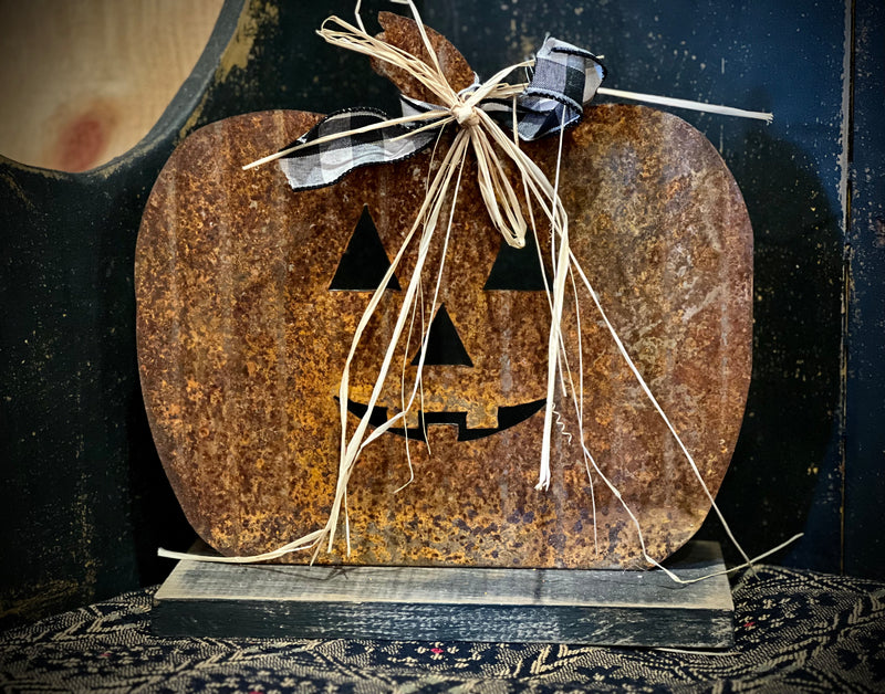 Rusted Tin Jack on Wood